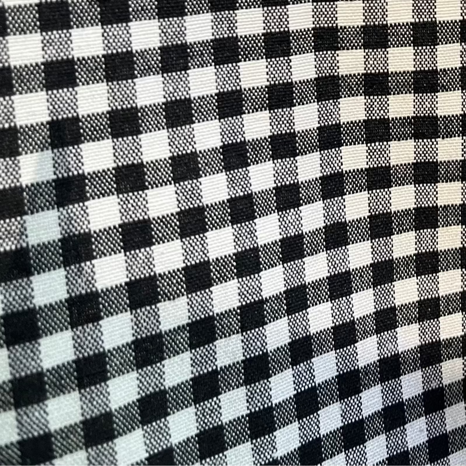 Black and white checkered fabric pattern