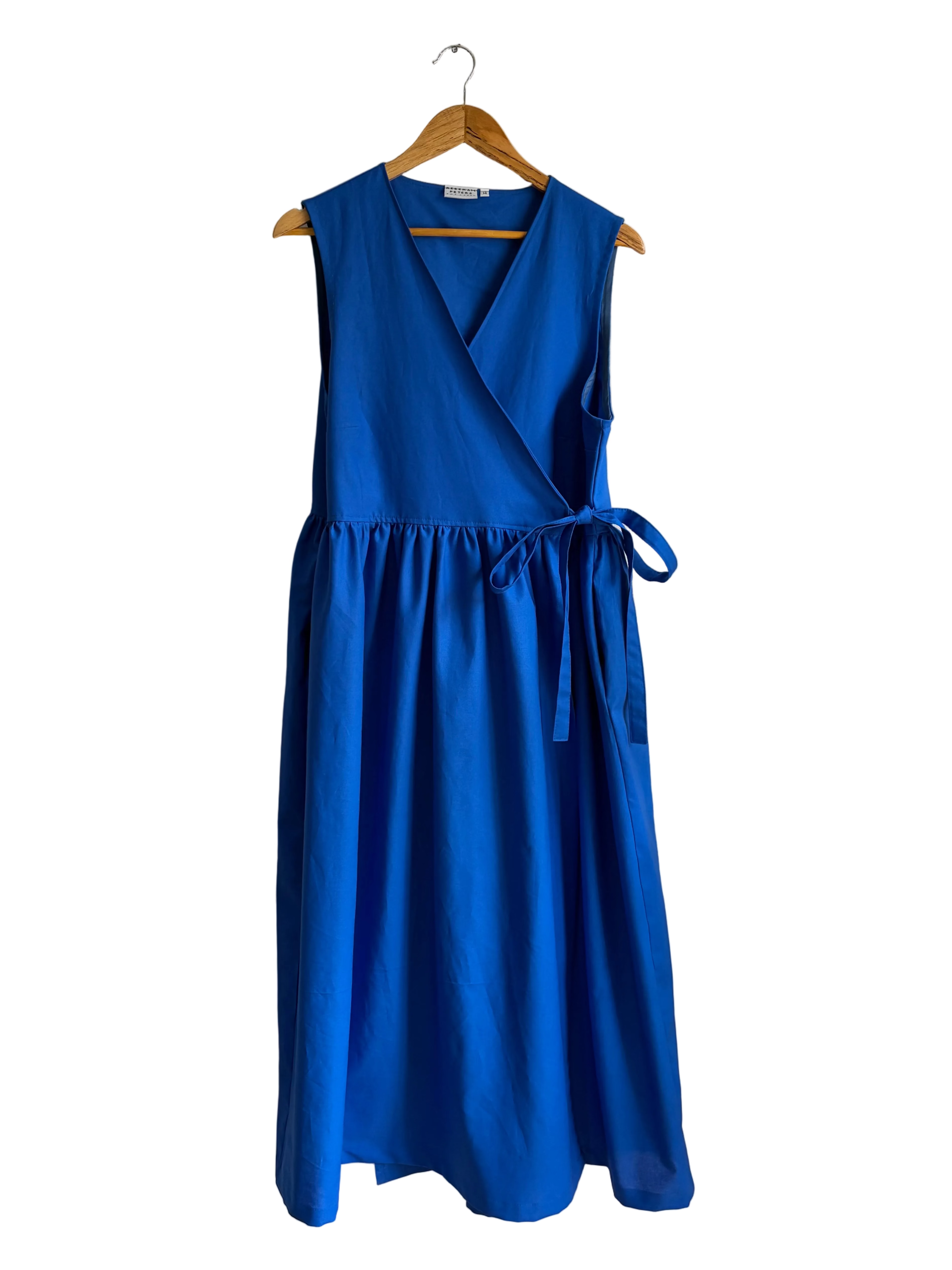 Blue dress with a belt on a white background